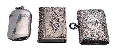 Two late Victorian silver vesta cases, one scroll engraved rectangular by G. W. Harvey & Co.