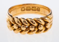 An antique gold keeper ring, 18ct pale rose gold, hallmarks for Sheffield 1911, weight 5.