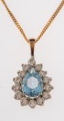 An aquamarine and diamond pendant,