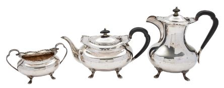 A George V silver three piece tea service by Atkin Brothers, Sheffield 1933, of baluster form,