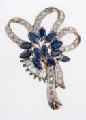 A vintage diamond and sapphire set flower and bow brooch, set with marquise form sapphires,