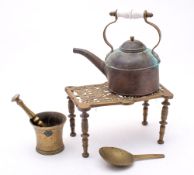 A bronze pestle and mortar:, together wi