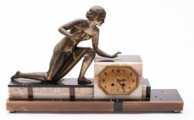 An Art Deco mantel clock mounted with a