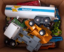 A collection of toy cars, including Tonk