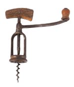 An unusual open frame steel corkscrew with a stag bone imitation handle and a long curved arm with