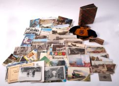 An album of photographic black and white landscapes,