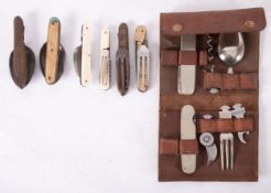 An early 20th century German multi-tool set, by Bonsa, comprising pocket knife, corkscrew, spoon,