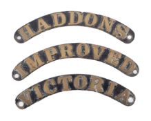 Three curved brass name plates (Haddons, Victoria, Improved), probably 1:10 name plates, 16.