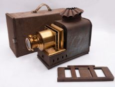 A late 19th/early 20th century tinplate Magic Lantern,
