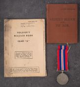 A WWII War Medal together with Soldier's Service Pay Book and Release Books for '14947532 Pte J