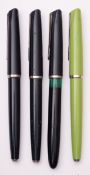 A group of three Universal (Italy) fountain pens, and a ball pen.