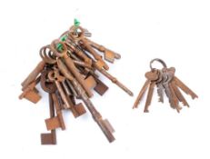 A collection of twenty six various blank keys;