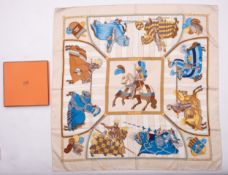 A Hermes silk scarf, in the 'Chocs En Plumes' pattern circa 1993,