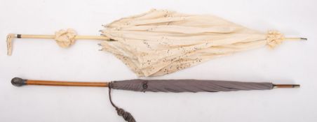 A late Victorian silver mounted lady's umbrella, the silver knop terminal, Birmingham 1890,