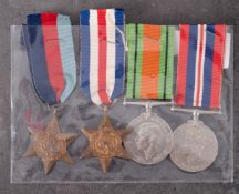 A WWII group of four comprising 1939-45 Star, France & Germany Star, War Medal and Defense Medal,