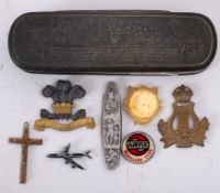 A Third Dragoons cap badge, together with one other cap badge, penknife etc.