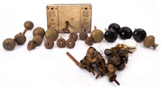 A Victorian rim lock with key, together with a quantity of brass door knobs, cup castors.
