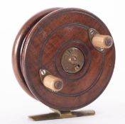 A Slaters Nottingham spine back fishing reel by C.