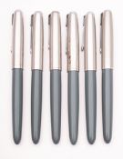 A group of six Parker 51 fountain pens, grey barrel with sliver plated caps.