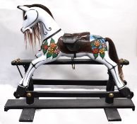 A 20th century wooden rocking horse,
