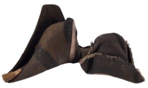 A Victorian bicorn hat, with silver band and button,