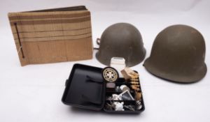 A WWII German photograph album containing photographs of troop manoeuvres and exercises,