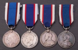 A group of four Royal Fleet Reserve LSGC Medals: '203005 DEV B 1461 W.P.Feeley P.D R.F.