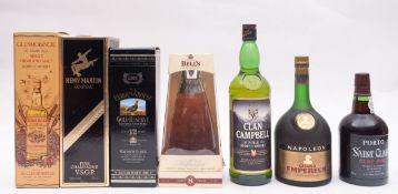 A bottle of Famous Grouse Gold Resreve, Glenmorangie 10 year old single malt,