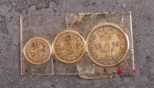 An 1875 Maundy set, 1d,2d and 4d in later case.