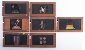 Seven mahogany framed hand painted single slip Magic Lantern slides, unsigned,