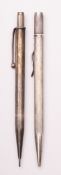 Two silver propelling pencils, various makers and dates.