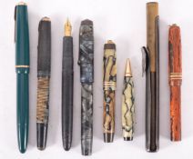 A collection of vintage fountain pens,