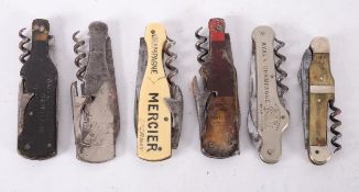 Six Korn's 1883 patent type and related folding knives with corkscrews and blades,