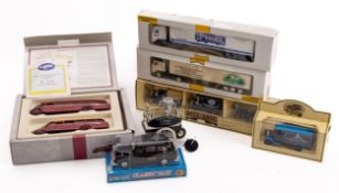 A small collection of boxed Corgi, Lledo and other vehicles (6).