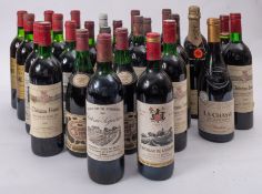 A collection of various red wines to include: four Chateau Fraux, Saint-Emillion Grand Cru 1989,