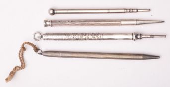 Three silver propelling pencils,