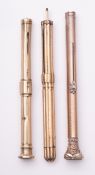 A late 19th/ early 20th century gilt combination propelling pencil and pen,