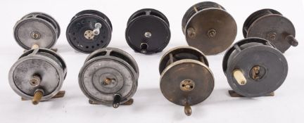 An all brass salmon reel, unmarked, together with a Hardy 'The Uniqua',