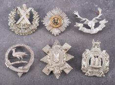 A Sterling Silver Scots Guards cap badge, maker Ludlow, London,