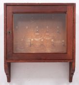 Lynton Post Office. An early 20th century pine and glazed wall hanging key box, 59x51.1x13.5cm.