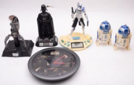 Lucas Film and others. A group of five Star Wars alarm clock and a wall clock.