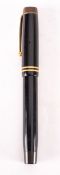 A Parker black Duofold pen, marked FOUNTAIN PEN PATENTED GEO S PARKER MADE IN CANADA,