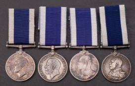 A group of four Royal Naval LSG Medals: '183542 W.J Ward LDG.Ship HMS Gibraltar ' '2380623 R.E.