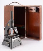 A cased microscope, maker Baker, London,
