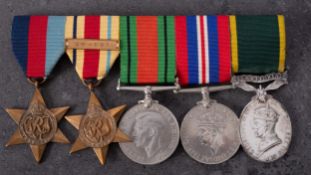 A WWII group of five, comprising 1939-45 Star, Africa Star with 8th Army Clasp, War Medal,