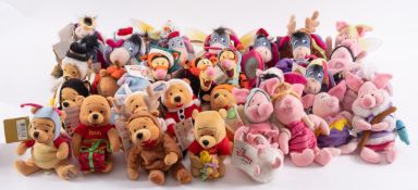 A collection of Disney soft toys, Tigger, Eeyore, Pooh, Piglet etc, some with original labels.