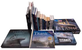 A collection of Titanic related books and collectables, including 'Titanic Survivor.