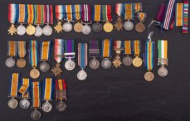 A collection of miniature medals and medal groups, QV to ERII, including five WWI groups.