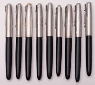 A group of nine Parker 51 fountain pens, black barrel with sliver plated caps.