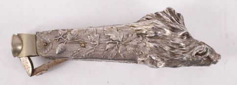 A late 19th/early 20th century Continental silver plated boar's head cigar cutter.
